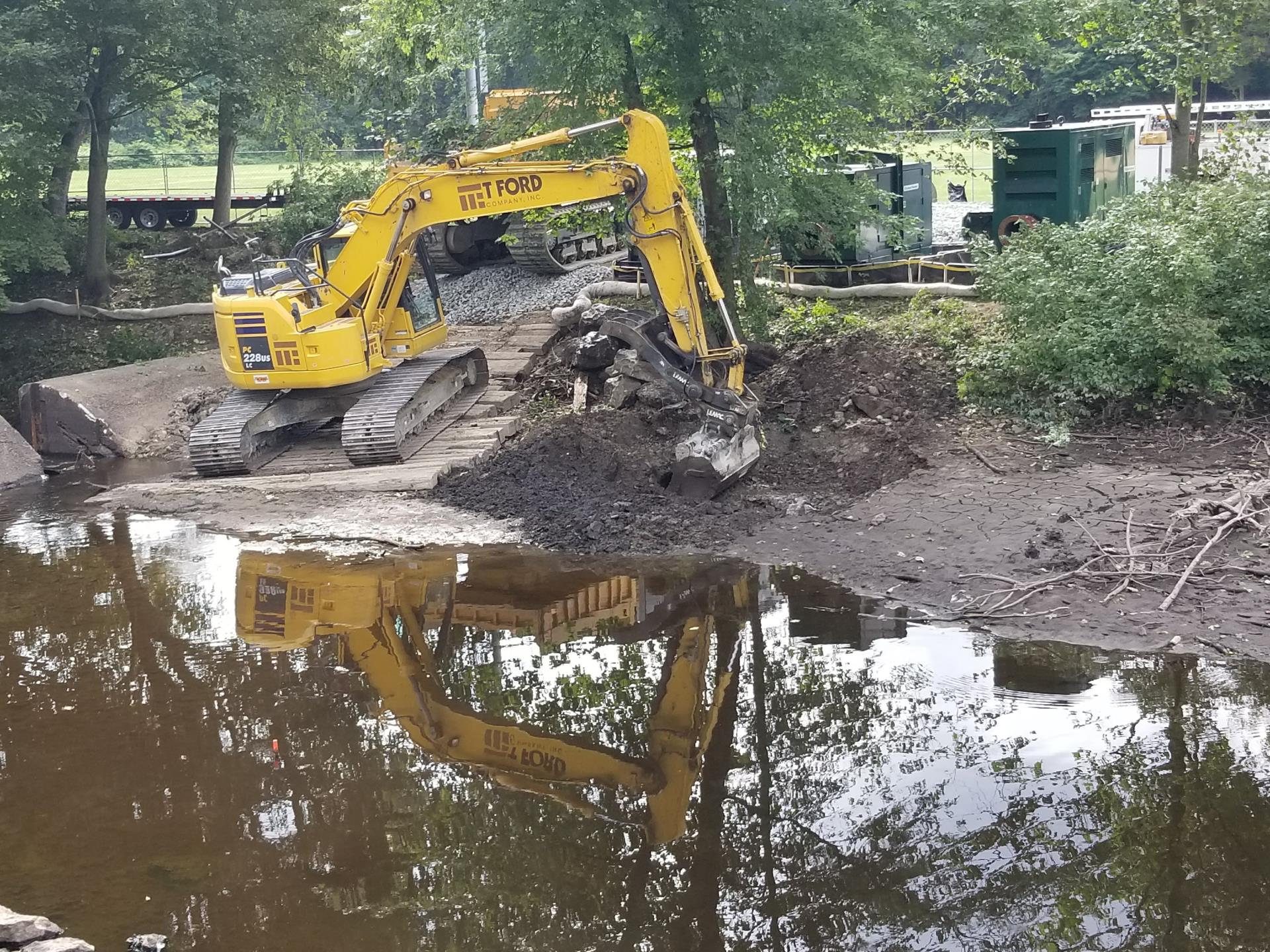 Excavating the sump for the by-pass