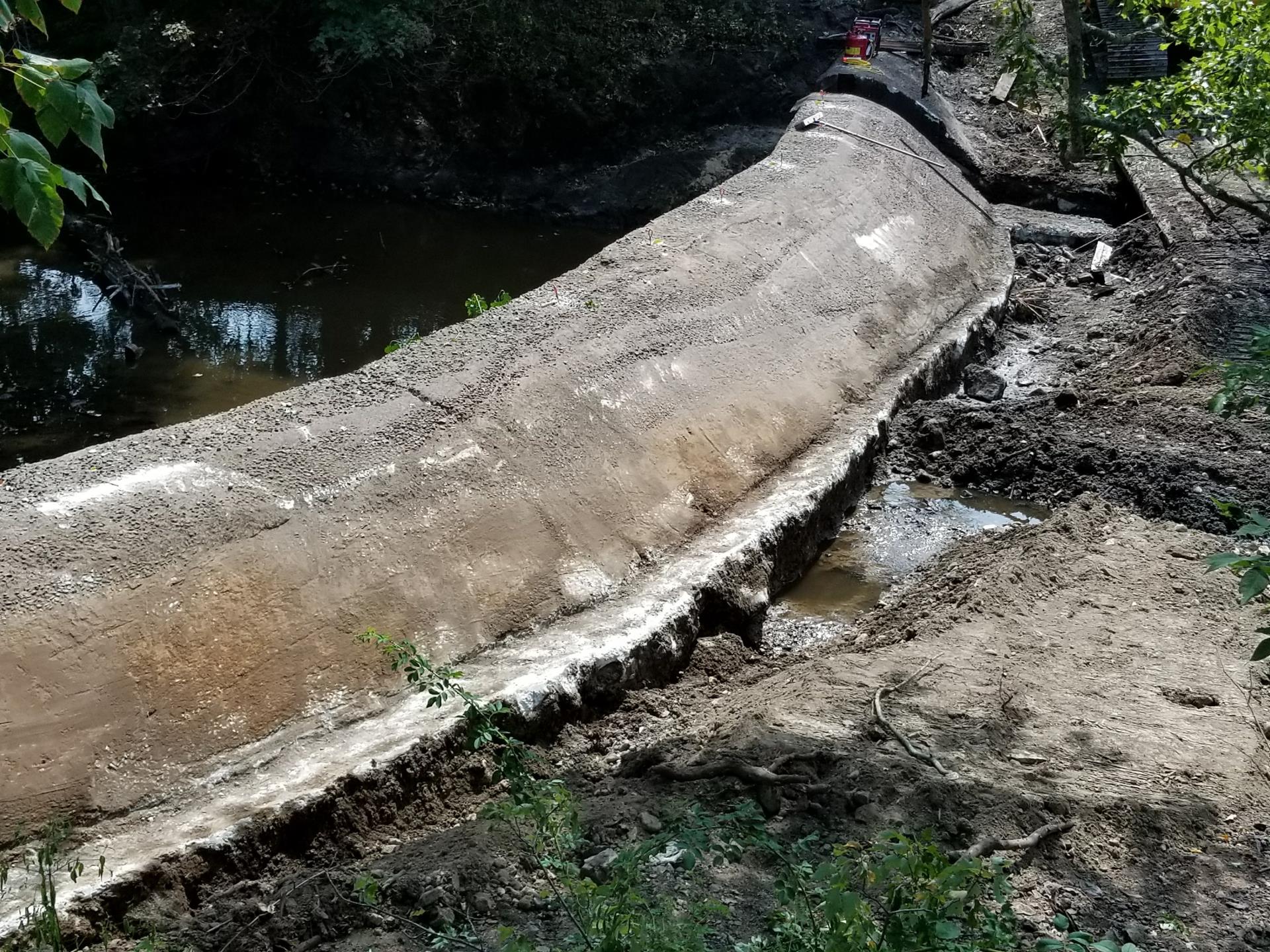 Began to expose the upstream face of the dam